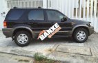 Cần bán lại xe Ford Escape XLT 3.0 V6. 4WD đời 2002, màu đen xe gia đình, 215tr